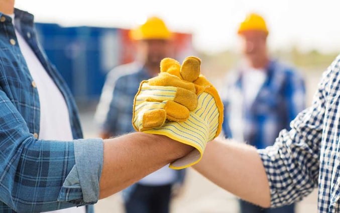 Construction Workers Shaking Hands