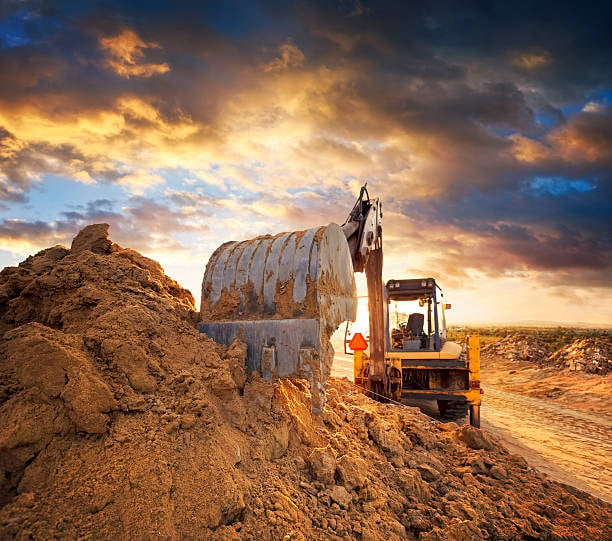 Equipment Picking Up dirt